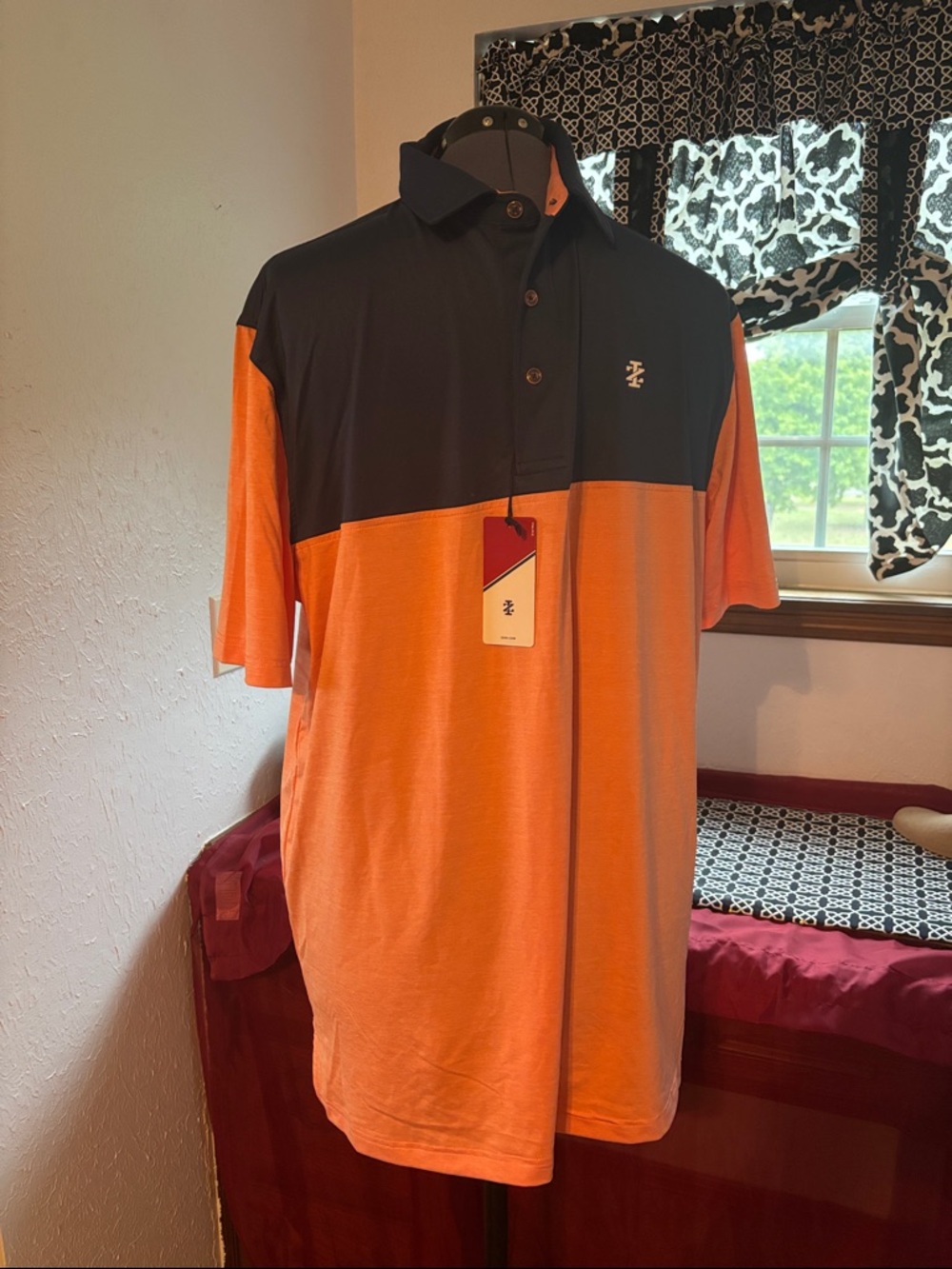 Izod Men’s Two-Block Polo in Orange and Blue